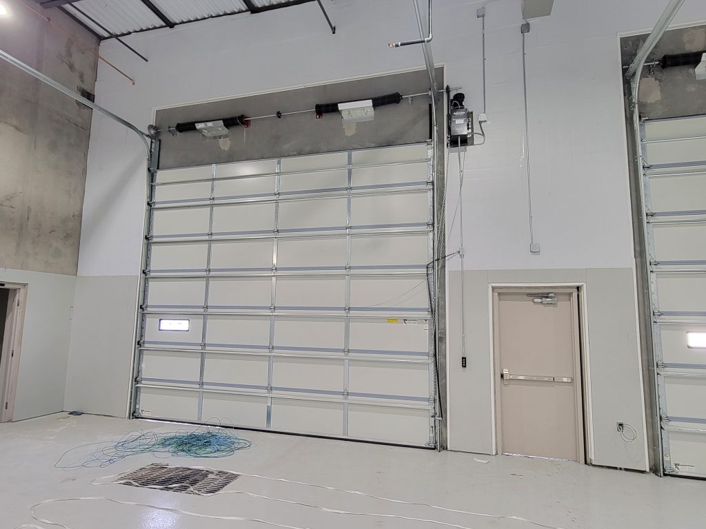 20240219_121513 Single garage door for industrial building