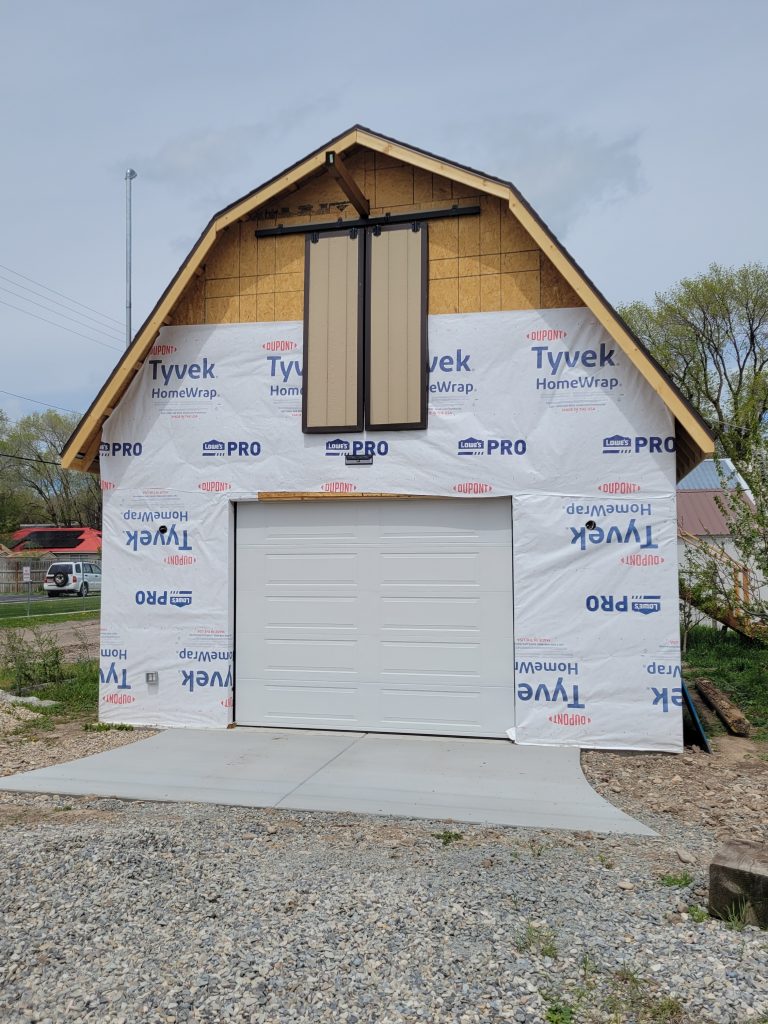 20240430_132528 Front of garage or barn showing the garage door